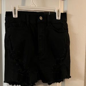 Distressed black high waisted shorts